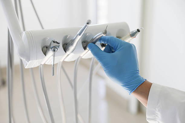 Professional Tooth Extraction technician working in Fannett, TX